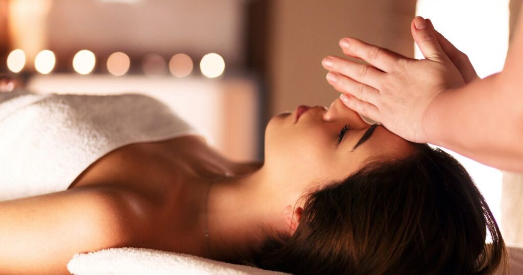 A woman receiving a facial massage